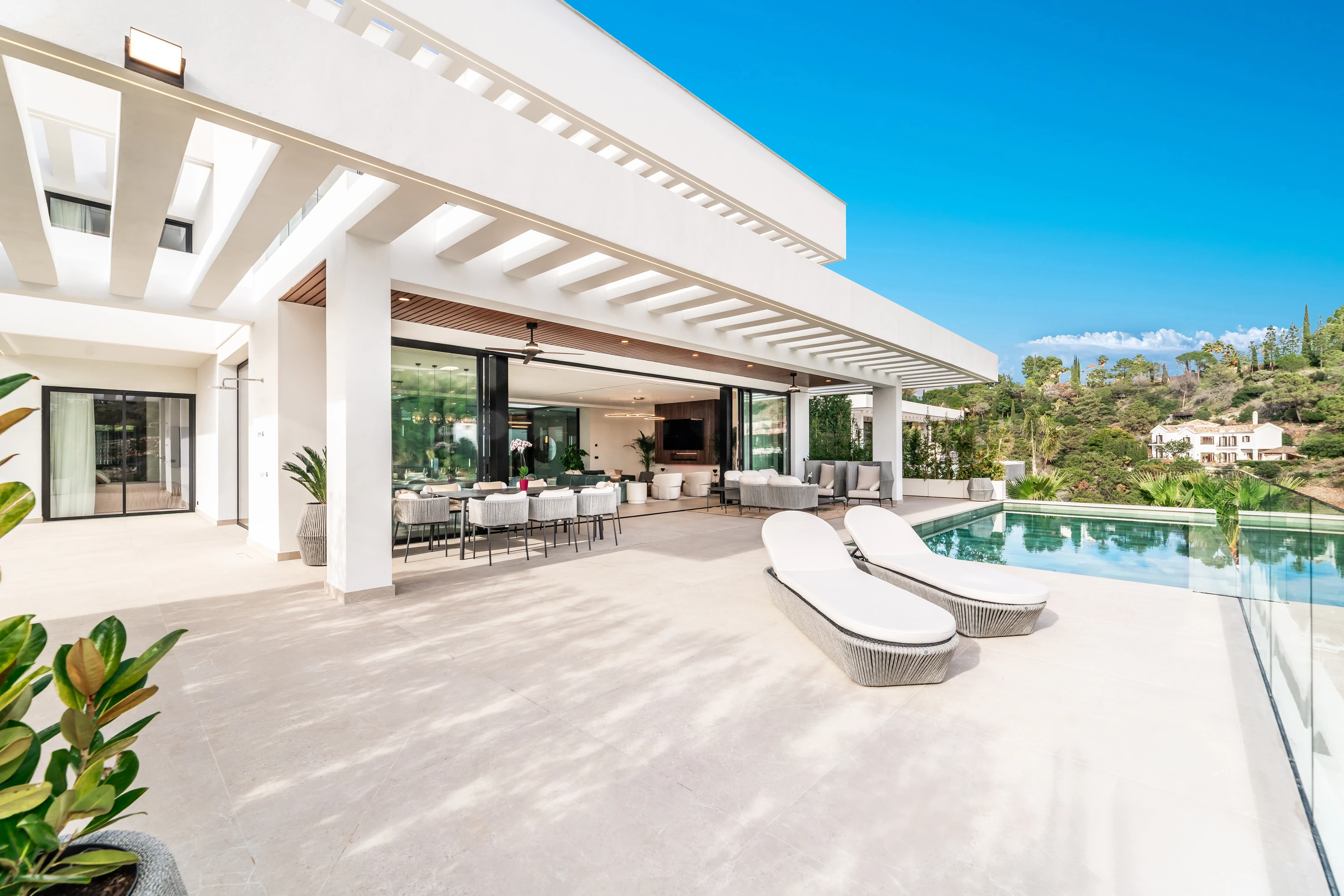 Terrace with sun loungers