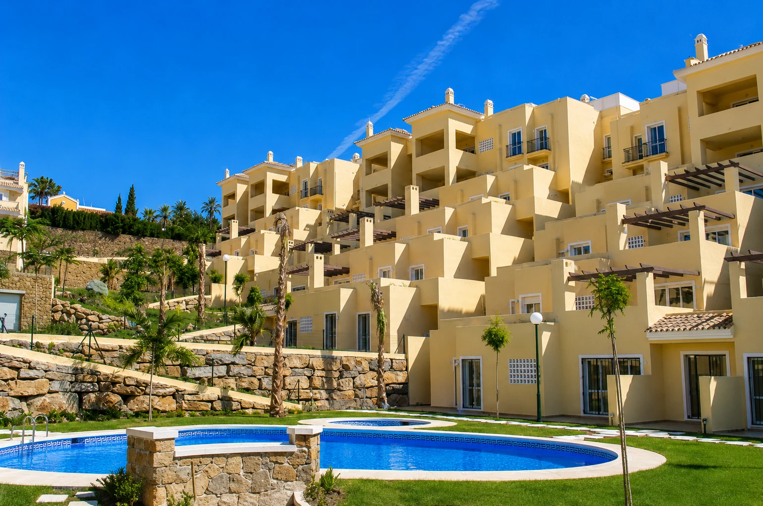 Gardens of a complex in Benahavís — architecture integrated in the landscape