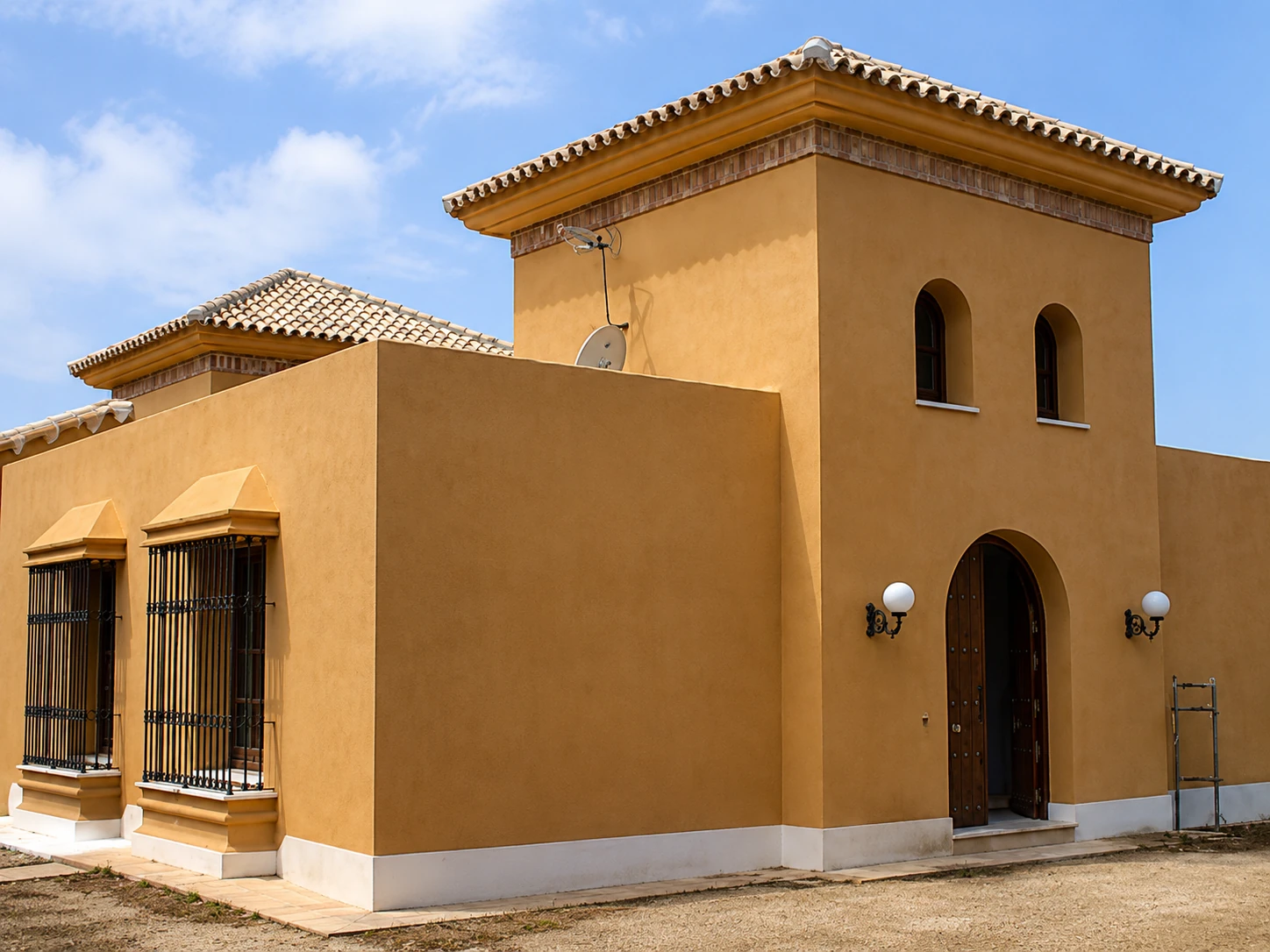 Villa with Columned Portico — Entrance tower and side facade
