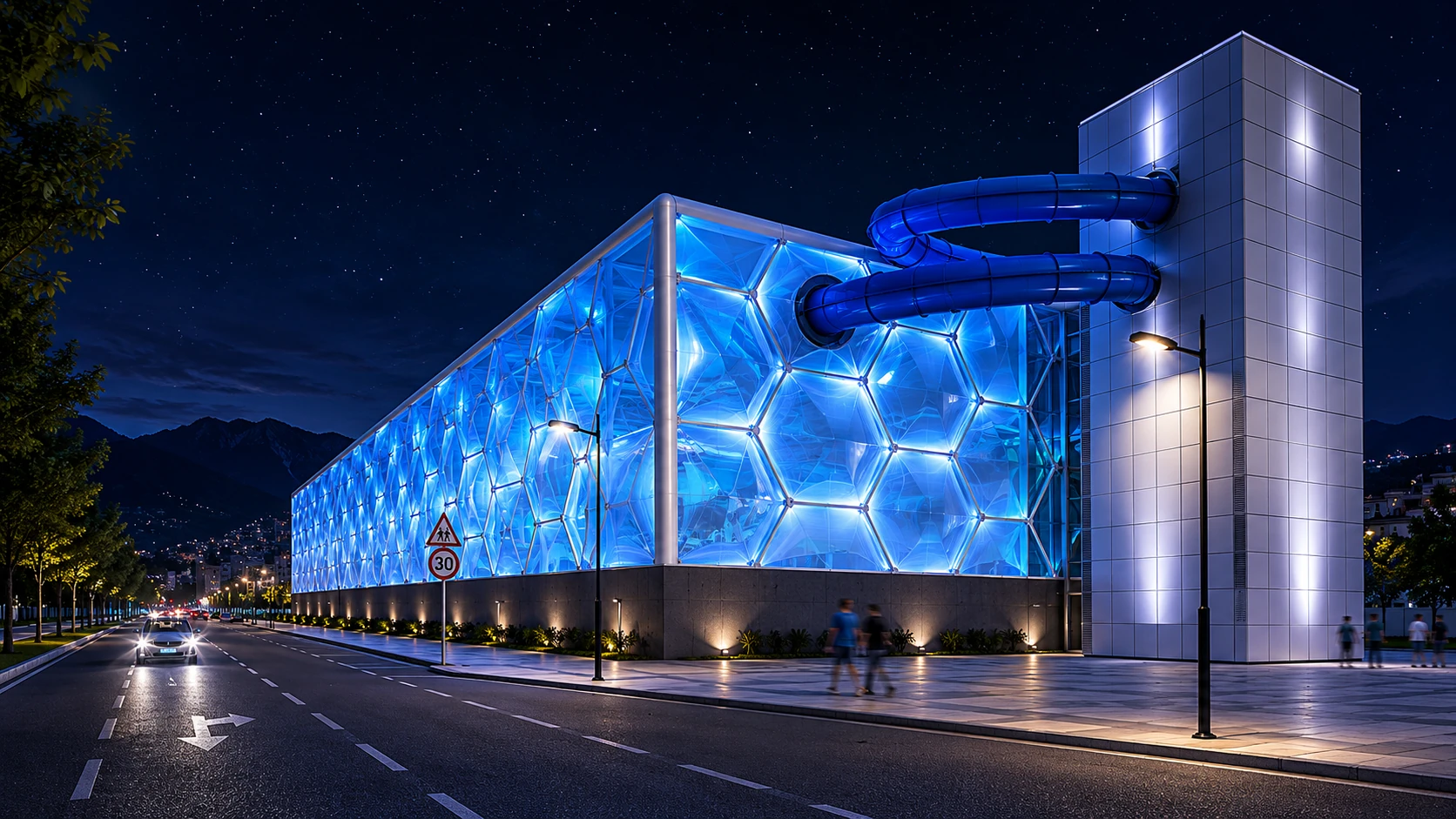 Night render of the Aquamijas water park extension, Fuengirola — ETFE roof lit from within