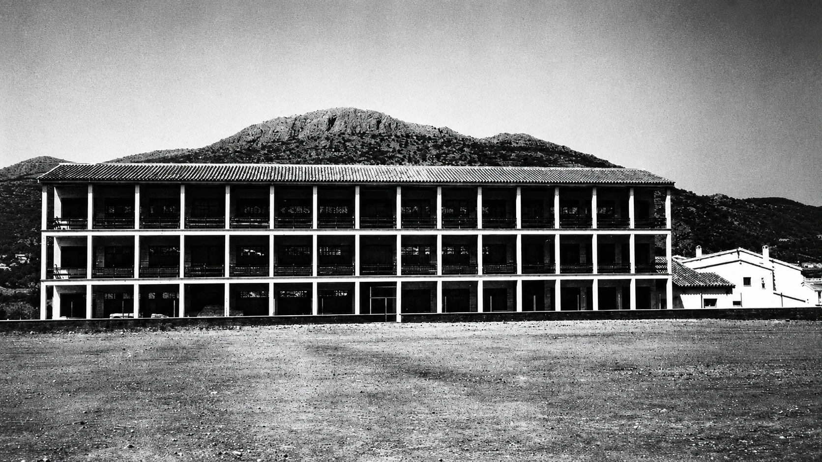 Main façade of the Alfarnate School Complex, designed by José María Santos Rein in 1964
